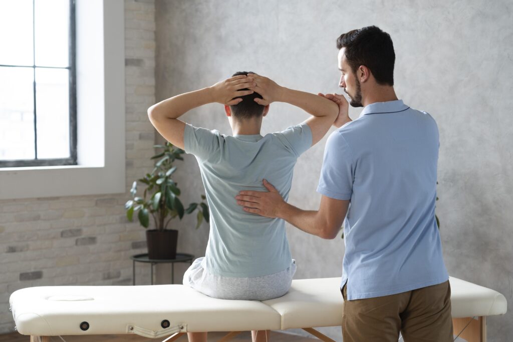 Can chiropractors prescribe medication? Chiropractor consulting patient
